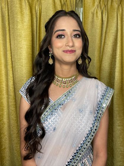 This bride is looking absolutely stunning and happy for her pre-wedding rituals. The look is subtle, beautiful, and lets her radiance shine.