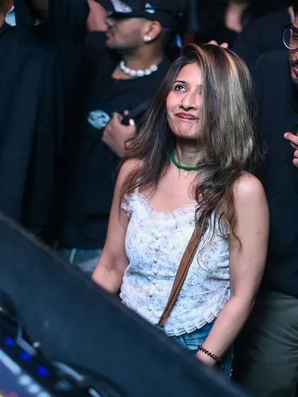 Another candid moment from the crowd, capturing the genuine fun of the night.