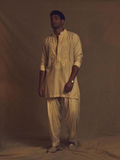 For Eid, I styled Siddhant Chaturvedi in this elegant ivory kurta set by Kunal Anil Tanna. The subtle embroidery and relaxed silhouette make it a perfect choice for festive daytime events.