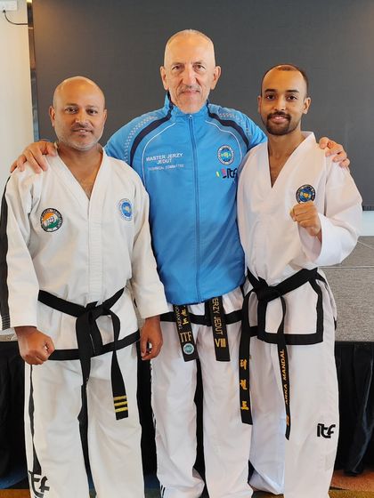 A photo with Master Jerzy Jedut (VIII Dan), a valuable learning opportunity for our instructional team.