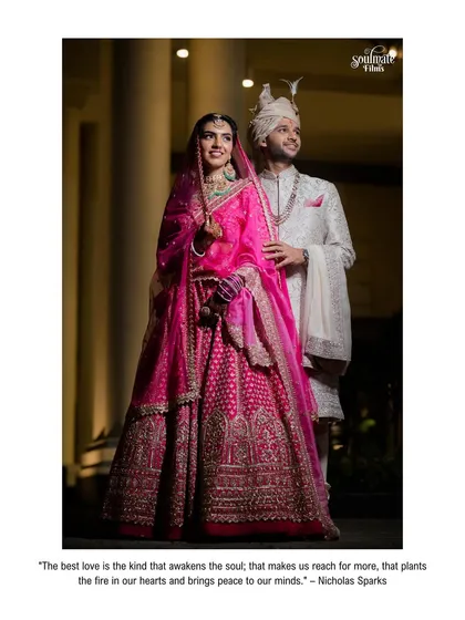 An elegant, full-length portrait of the couple on their wedding day. Their regal posture and the beautiful lighting create a timeless and classic image.