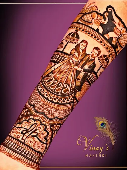 A close-up of a custom bridal design featuring a portrait of the couple. The fine lines and shading bring their figures to life, making the mehndi truly special.