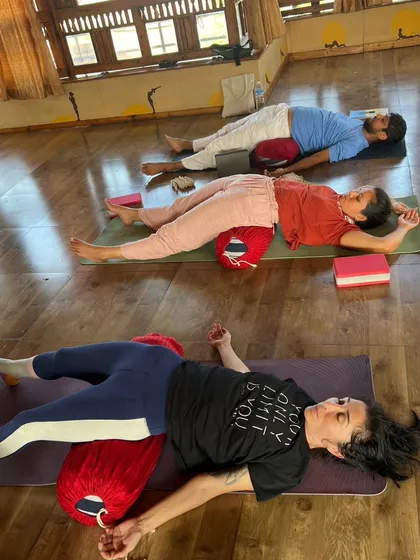 In our Yin and Restorative classes, we learn the art of surrender. Using props like bolsters allows the body to release completely, calming the nervous system and promoting deep rest.