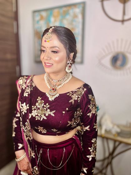 A smiling and confident guest, looking stunning in her party attire.