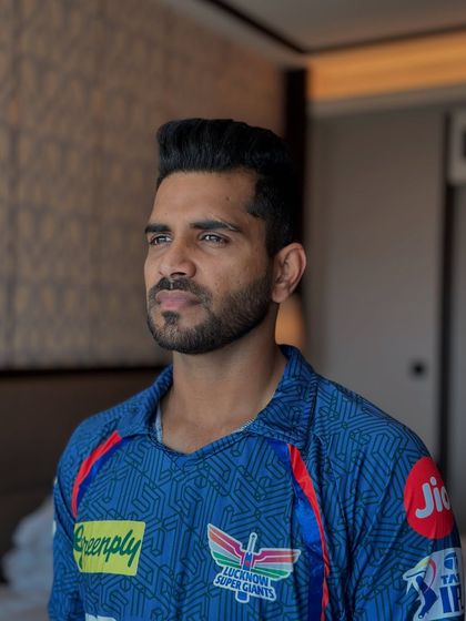 Another angle of Shivam Mavi's fresh cut. A classic, confident style for a talented player.