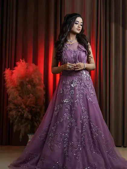 This shot captures the beautiful drape and fall of the onion pink gown. It's designed to be as comfortable as it is beautiful, so you can enjoy your special day to the fullest.