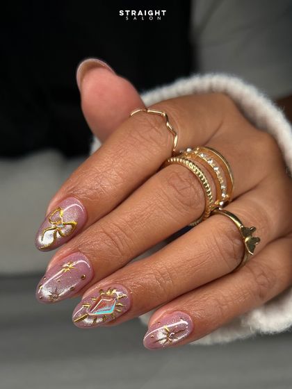 A close-up of the hand-painted gold celestial art. The fine lines and shimmering base create a magical and luxurious look.