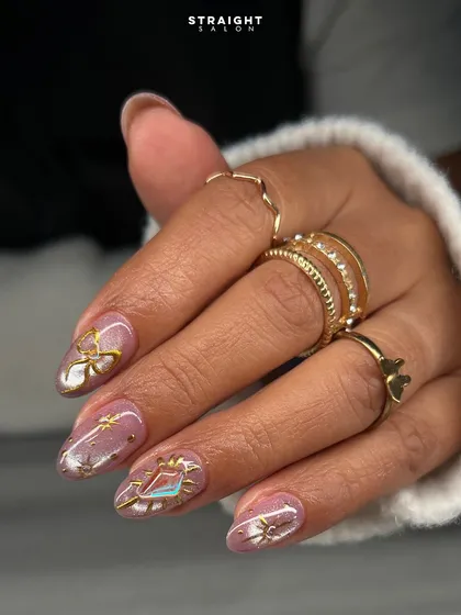 A close-up of the hand-painted gold celestial art. The fine lines and shimmering base create a magical and luxurious look.