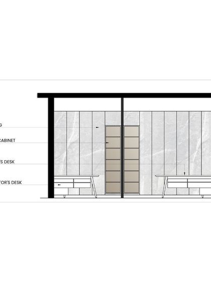 The initial technical drawing for one of the office walls, showing the planned layout for paneling, display cabinets, and desks. This is where our vision begins to take concrete form.