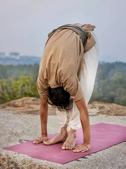 A simple forward bend on a clifftop. My only regret about yoga is that I did not start earlier in my life.