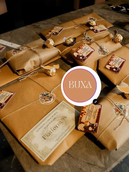 Owl post delivery. These Harry Potter themed gifts are wrapped in brown paper and twine, complete with a Platform 9¾ ticket and other magical details.