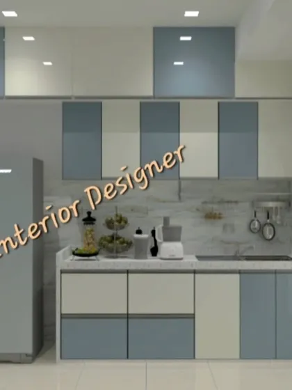 A simple yet elegant modular kitchen with a two-tone design in light blue and cream. This is a great example of our budget-friendly yet stylish interior solutions.