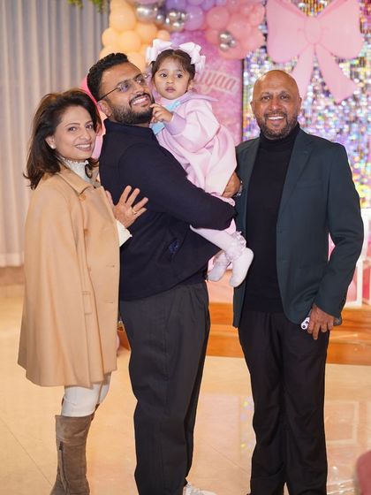 A beautiful family photo from a Barbie-themed birthday party. We provide a glamorous backdrop for families to capture their most cherished moments together.