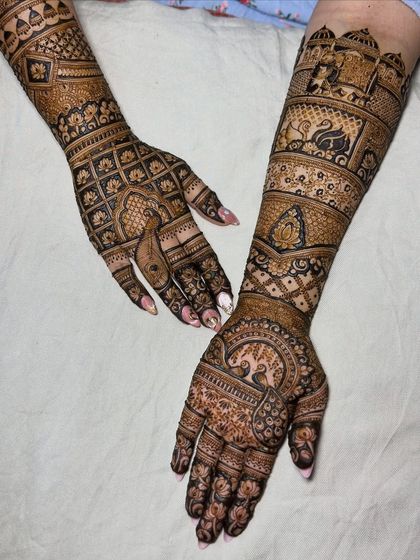 This bride wanted a very traditional mehendi with lots of classic Indian motifs. We included peacocks, swans, and elephants to bring her vision to life.