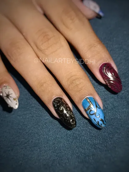 The full "Howl's Moving Castle" inspired set, with each nail featuring a different element from the beloved Ghibli film.