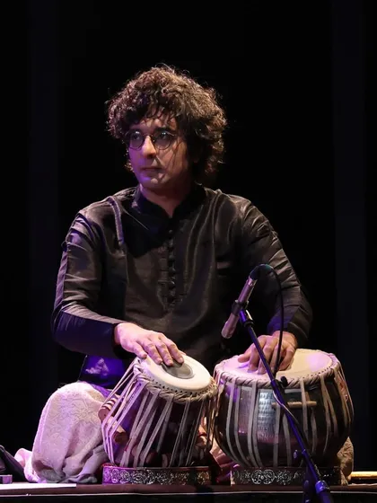 A powerful performance shot from the jazz concert. The black kurta helps in creating a classic, understated look on stage.