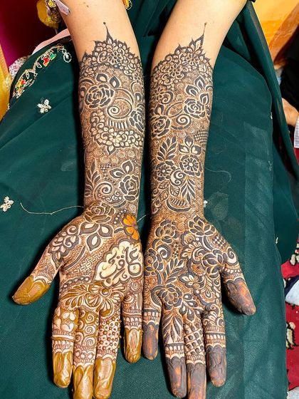 A full bridal design with a mix of negative space and dense patterns. The design is unique and modern.