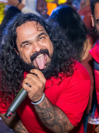 Our frontman Keyoor, mid-performance, bringing his signature crazy energy. This is the vibe that gets the crowd going and makes for unforgettable nights and even better pictures.