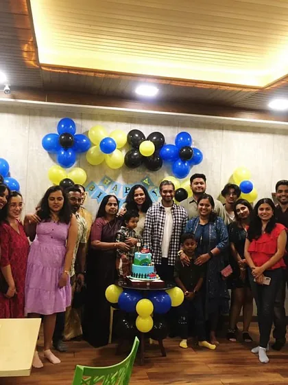 My venue is perfect for hosting large family gatherings for birthday celebrations. Here, a happy family poses for a group photo, marking a special day filled with fun, food, and togetherness.