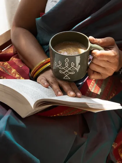 A quiet moment with a mug from the Kolam collection. These pieces are inspired by the beautiful, ephemeral rice flour drawings from my heritage, bringing a sense of tradition and warmth to your daily coffee or chai.