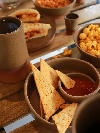 A chip and dip bowl set from the 'Moments Together' collection, perfect for sharing snacks and creating a relaxed, communal atmosphere.