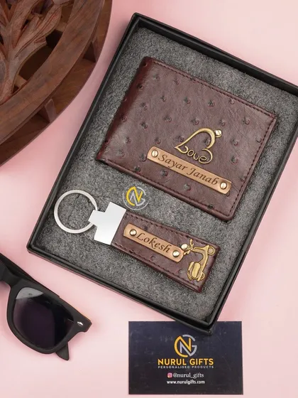 This brown dotted-texture wallet and keychain set is personalized with names and charms, making it a unique and thoughtful gift.