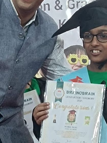 A proud graduate receiving his certificate at our grand graduation ceremony. This milestone marks the completion of our 10-level program and a journey of incredible growth.