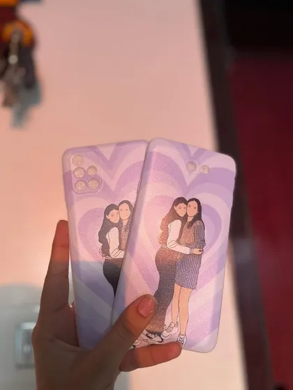 Matching phone cases are a super popular gift for best friends. Here's an example of custom illustrated cases I made for two different phone models, showing that you and your friend can have a matching design even with different devices.