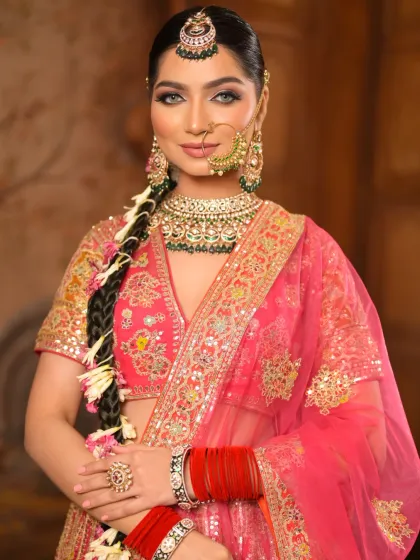 This close-up captures the essence of my luxury bridal service. Notice the flawless, dewy skin, the sharp winged eyeliner, and the perfectly blended eyeshadow that makes her eyes the centerpiece of this fairytale look.