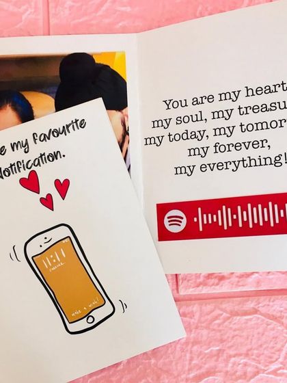 A custom greeting card that pairs a photo with a scannable Spotify code, combining a visual memory with a special song.