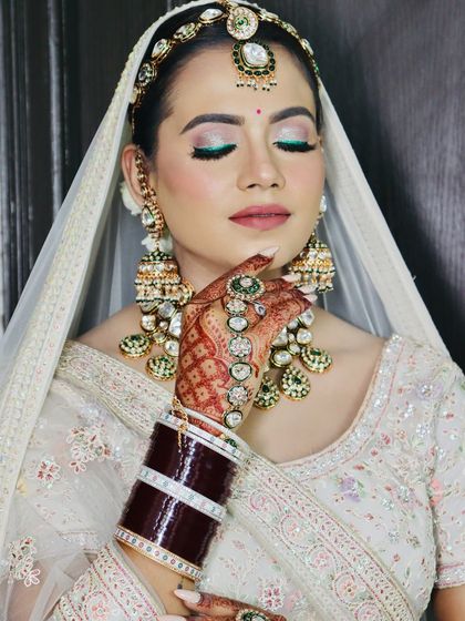 A close-up with eyes closed, showing the beautiful blend of eyeshadows.