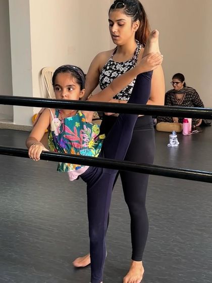 Our students are always growing. These images capture their progress in flexibility and technique, from deep splits to high extensions at the barre, with guidance from our teachers.