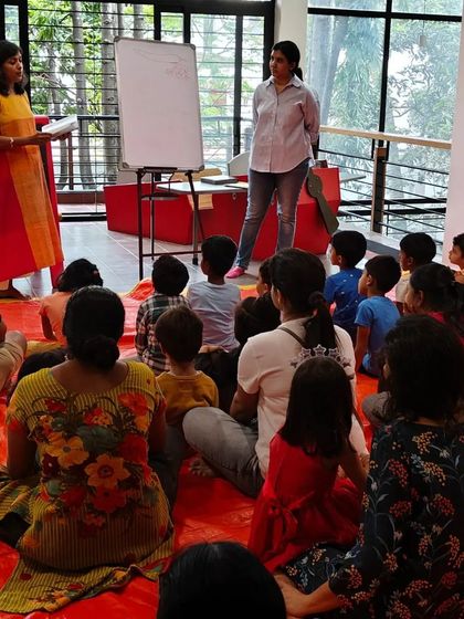 A different angle of the storytelling session, showing the cozy and communal atmosphere.