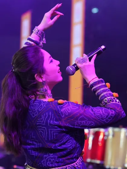 Day 8 of non-stop fun at Raas Rang Thane. Here I am, mid-performance, feeling the energy of the music and the crowd.