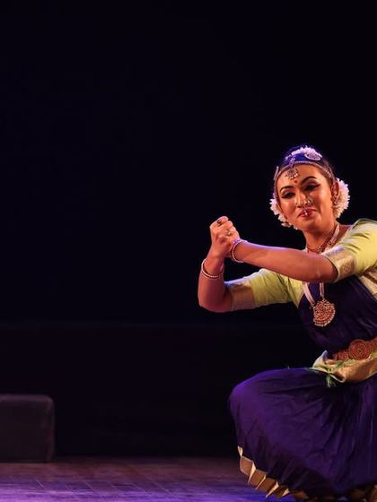 A graceful solo performance from the Sadhana Classical Dance Festival. The dancer's elegant posture and expressive mudra capture the essence of Bharatanatyam.