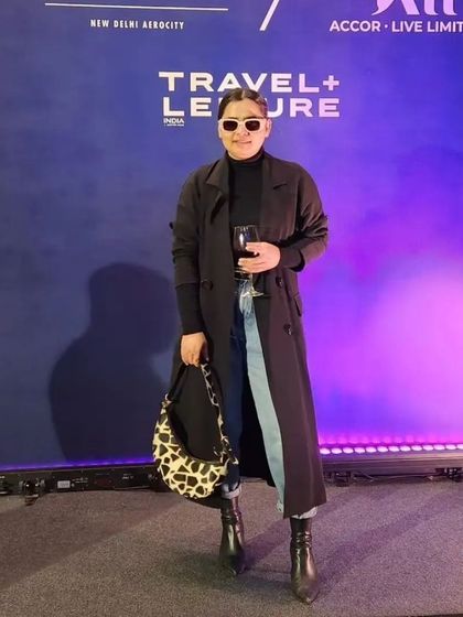 A customer at an event with her Selena in a bold cattle print. It’s a versatile piece that can be dressed up or down.