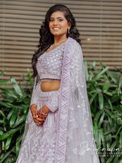 A lovely, welcoming portrait of the bride smiling directly at the camera. While I love candids, I also make sure to capture these beautiful, classic shots.