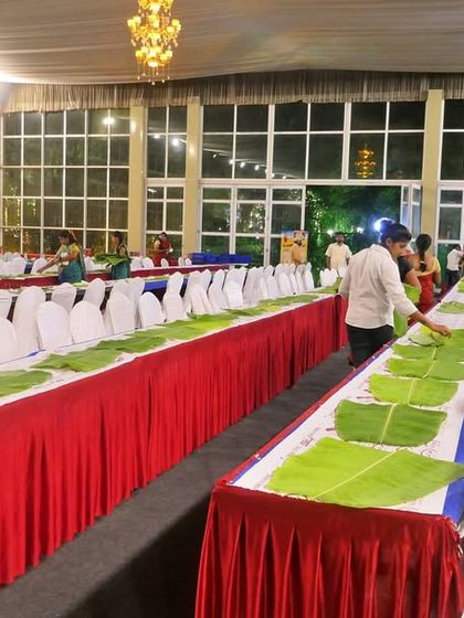 A look at the extensive seating arrangement we can create for your event. The long, continuous rows are prepared for a traditional banana leaf meal at the Palace Grounds.
