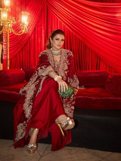 For a Sufi night, I gave Natasha Luthra a mystical and glamorous look. The makeup features sultry, defined eyes and a radiant complexion, set against a rich red backdrop that enhances the drama and elegance of the evening.