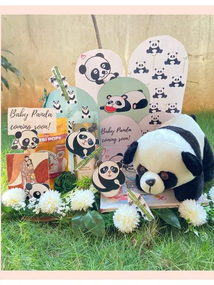 A "pandastic" surprise for the parents-to-be. This adorable panda-themed hamper is filled with goodies to pamper expecting parents as they await their little one.
