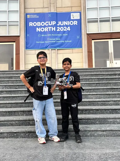 We are on location at the RoboCup Junior North 2024 competition. Our teams, like the Rescue Rangers pictured here, get to test their skills against the best, representing our club with pride and putting their learning into practice on a national stage.