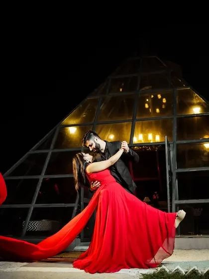 For couples who want something bold and cinematic, I create dramatic pre-wedding portraits like this. Using creative lighting and dynamic elements like the flowing red gown, we can produce truly unforgettable images before your big day.
