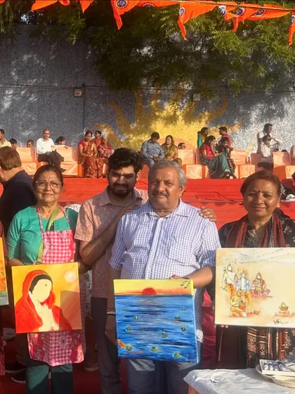 More smiling faces from the Indian New Year celebration and live painting event in Delhi.