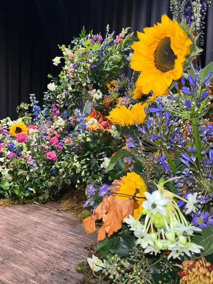 The pathway through my custom-built floral meadow set. The design was intended to be fully immersive, allowing you to feel like you are walking through a field of flowers in full bloom.