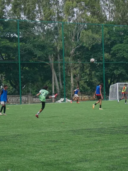 A player connects with a volley during a trial match. We encourage players to express themselves and show their technical flair.
