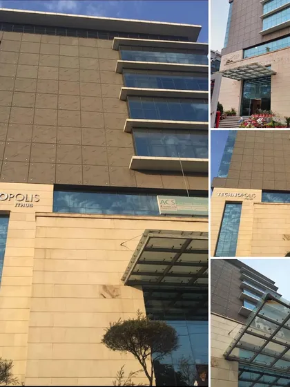 Multiple angles of the Technopolis building, focusing on the entrance canopy and the upper-level facade articulation. The design remains a benchmark for functional IT infrastructure in the region.