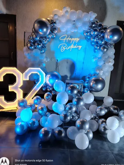 The same 32nd birthday setup, but with blue lighting to show how the mood can be changed.