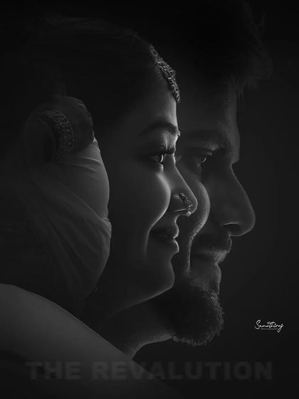 A creative black and white double exposure, blending the profiles of the mother, father, and baby bump. This is a unique and artistic representation of a growing family.