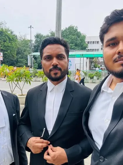 With my associates outside a court complex. A collaborative team approach is essential in civil litigation to ensure every angle of a case is thoroughly examined and argued.