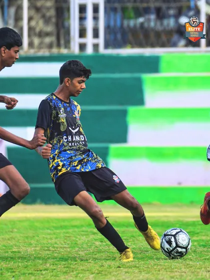 A player weaving through the opposition, showcasing the technical ability we foster.